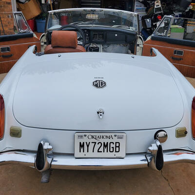 I have the tan material to cover the door arm rests, but I kinda like the blue on brown...Also, notice the new vanity plate. There's a website to go along with it. https://my72mgb.com